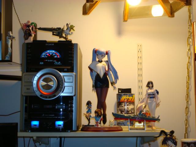 The stereo system surrounded by various anime characters. The Ruri figure was quite hard to build.